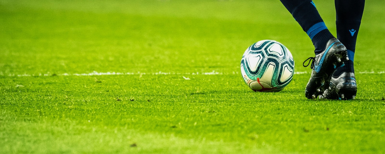 Fußball auf dem Rasen — künstliche Intelligenz für Sportwetten