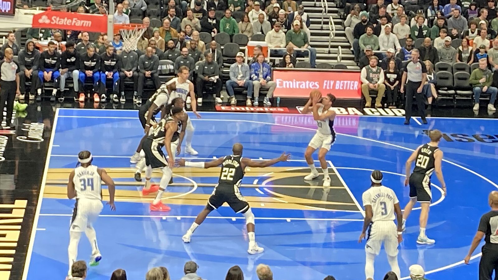 NBA game with a player shooting at the basket, the kind of situation props are built around