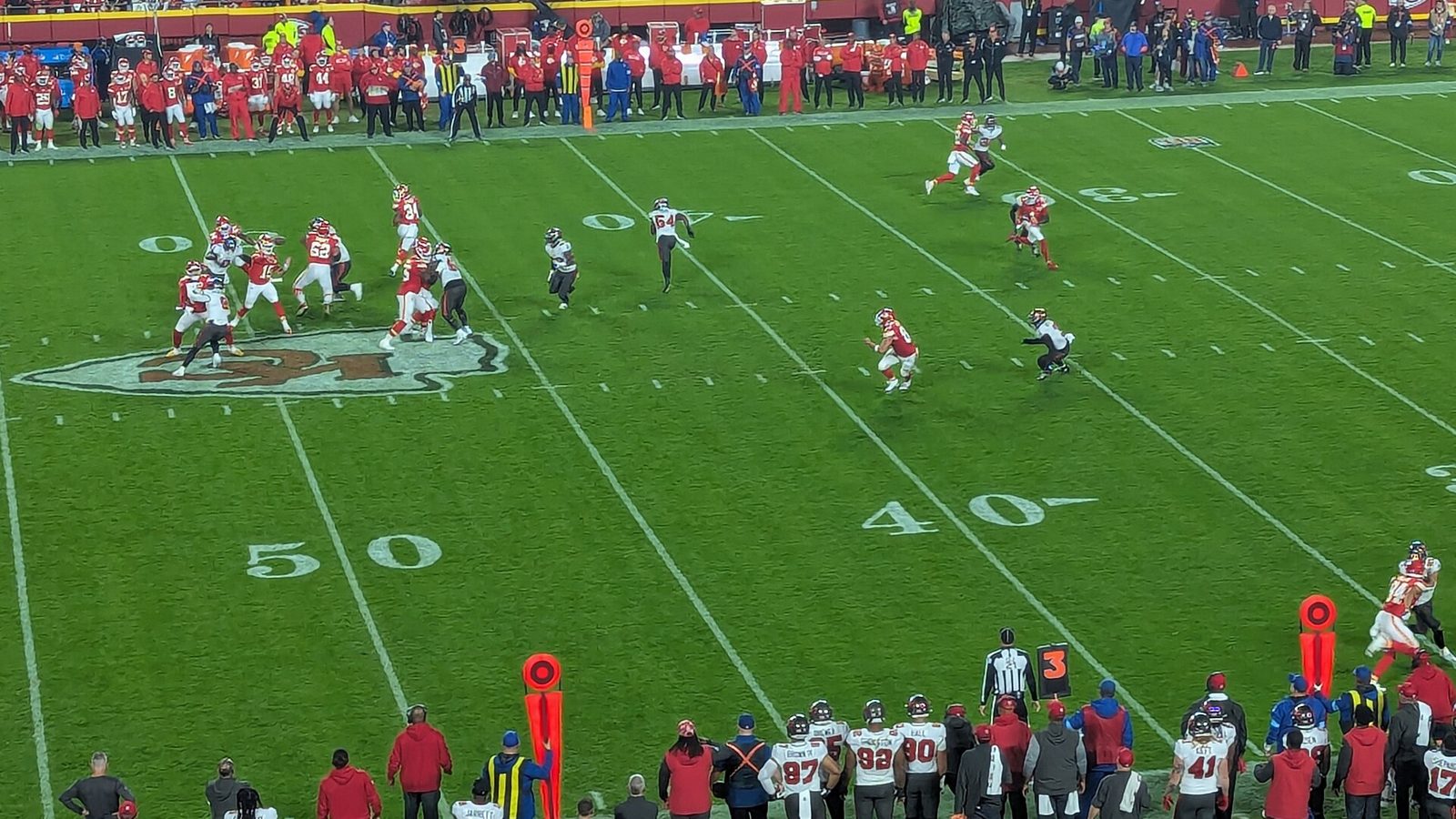 American football game with the quarterback about to throw
